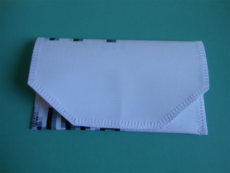 TA-006  7 euro telefoontasje met vakjes Buitenmaat: 14 cm breed, 8 cm hoog.