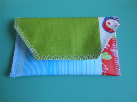 TA-008 7,00 euro telefoontasje. Buitenmaat:12,5 cm breed, 7 cm hoog.